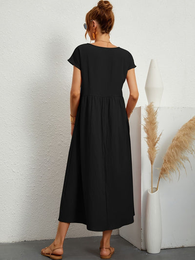 "Kimber - Midi-Relaxed Kleid mit Rundhalsausschnitt" could be rewritten as "Kimber - Midi-Relaxed Kleid mit Rundhalsdesign".